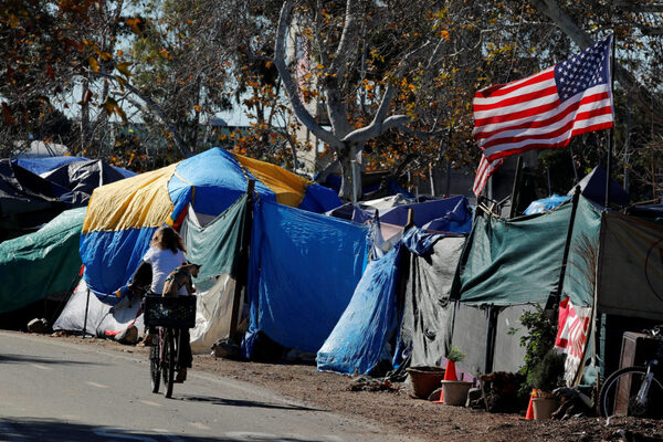 City officials have begun what they are calling a slow and methodical clean up and removal of a large homeless encampment along the Santa Ana River Trail in Anaheim, California